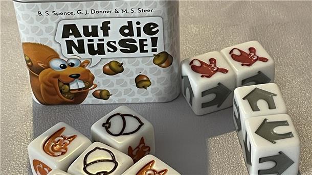 Würfelspiel „Auf die Nüsse"