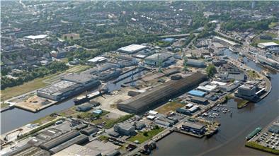 Aus der Luft wird die Dimension des Areals des geplanten Werftquartiers in Bremerhaven deutlich: Hier soll das Werftquartier wachsen.