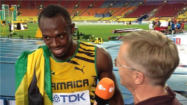 Bei der Arbeit: Norbert König im Gespräch mit dem Super-Sprinter Usain Bolt.