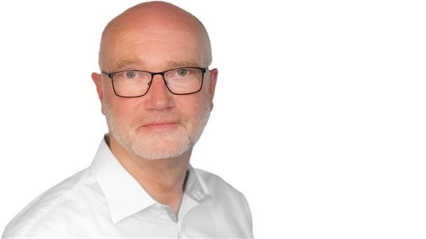 Der Finanzsenator strahlt trotz eines Riesenbergs an Problemen Porträt von Klaus Mündelein