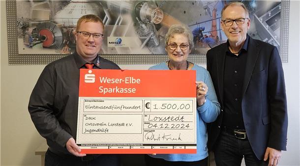 Übergabe eines Spendenschecks