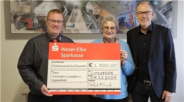 Übergabe eines Spendenschecks