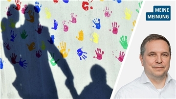 ein Mann mit Kindern im Schatten