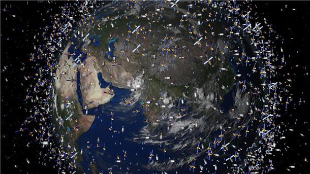 Wie schützt man die Erdumlaufbahn vor Weltraumschrott? Das computergenerierte Bild zeigt Weltraummüll früherer Weltraummissionen, der neben intakten Satelliten um die Erde kreist.