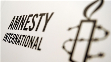 Das Logo von Amnesty International.