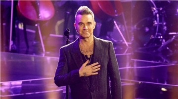 Der britische Popstar Robbie Williams wird nächstes Jahr als Headliner auf dem königlichen Landsitz Sandringham auftreten.