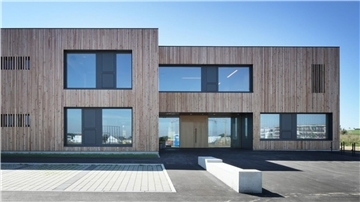 Diese Illustration zeigt die Holzfassade, die die neue Kita bekommen soll.