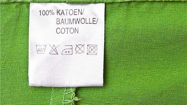 Leben nach Standards: Wie DIN- und andere Normen unseren Alltag bestimmen Etikett Baumwolle