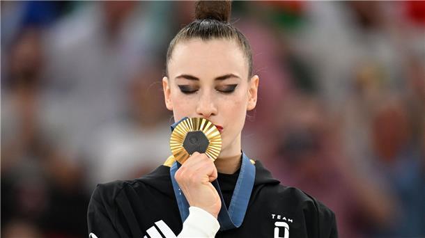 Ein Kuss für Gold: Gymnastinnen hoffen auf mehr Popularität.