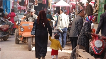Eine belebte Straße in der Stadt Kashgar im westchinesischen Xinjiang (Archivbild).