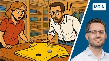 Eine Comic-Zeichnung, die ein gelbes T-Shirt auf einem Tisch zeigt. Im T-Shirt ist ein Loch. Eine Faru und ein Mann stehen an dem Tisch und schauen entgeistert auf das T-Shirt, auf dem eine Plombe liegt. Sie stehen in einem Bekleidungsgeschäft.