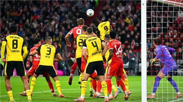 „Irre“ und „Wahnsinn“: Kane erfreut mit Rundum-sorglos-Paket Harry Kane (hinten, Mitte l) brachte den FC Bayern früh in Führung.