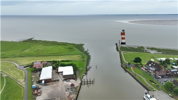 Der Rote Sand in Fedderwardersiel in Butjadingen - eine Montage zeigt den neuen Standort.