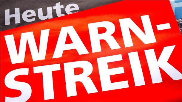 Plakat mit der Aufschrift: Heute Warnstreik
