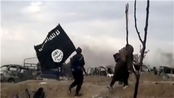 IS-Kämpfer im syrischen Baghus: Der IS kontrollierte über Jahre große Gebiete im Irak und im benachbarten Bürgerkriegsland Syrien (Archivbild).