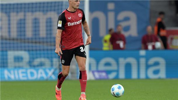 Auftakt im Hexenkessel: Bayers brisantes Spiel in Rotterdam Leverkusens Granit Xhaka freut sich auf sein erstes Spiel in Rotterdam.