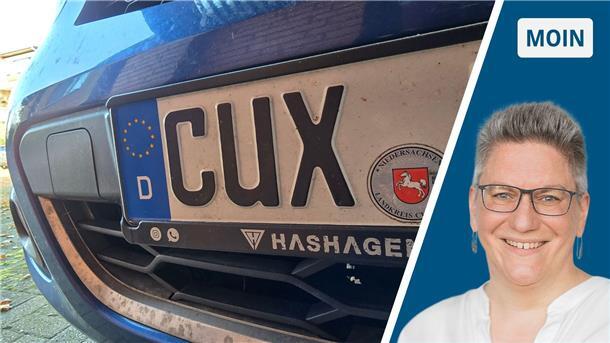 CUX-Autokennzeichen an einem blauen Auto