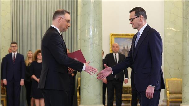 Nach Wahlschlappe: PiS zögert Machtwechsel in Polen hinaus Polens Präsident Andrzej Duda und der ehemalige Ministerpräsident Mateusz Morawiecki in Warschau.