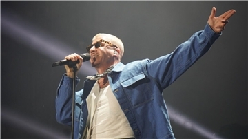 Der US-Rapper Macklemore auf dem Deichbrand-Festival 2025.