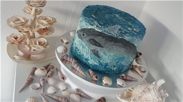 Was schwimmt denn da? Der Hai in der Torte ist nur für die Figur gefährlich.