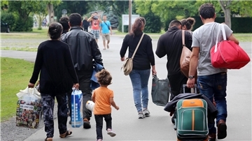  Eine irakische Familie kommt am 14.07.2015 im Grenzdurchgangslager Friedland (Niedersachsen) an. 